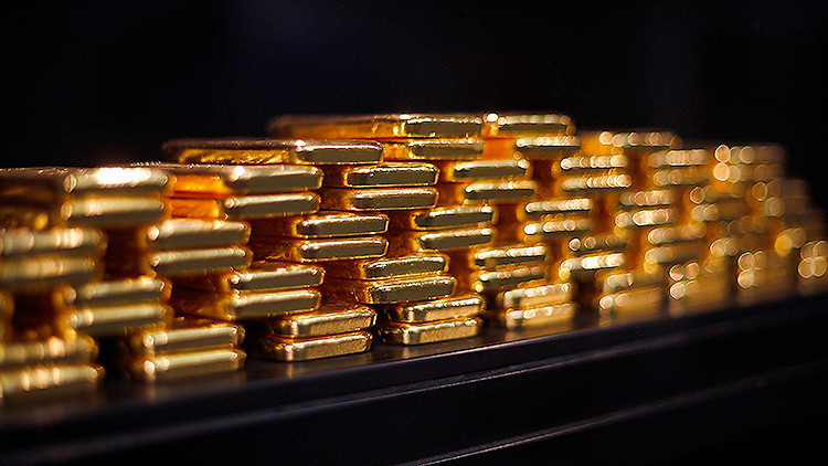 ¿Presagia la caída del precio de oro récord la ruina de la economía mundial?