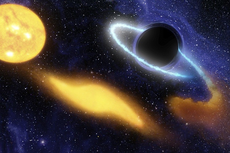 Un agujero negro absorbe a un astro