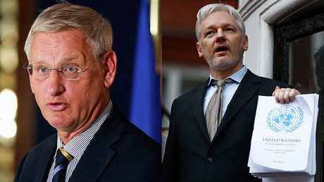 El ex primer ministro sueco, Carl Bildt (izquierda), y el fundador de WikiLeaks, Julian Assange.